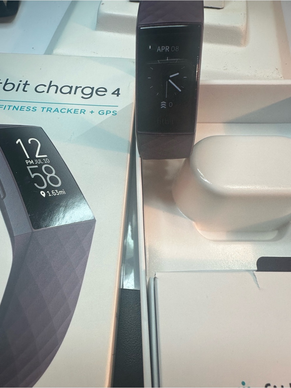 fitbit Charge 4 Fitness Tracker in Plum